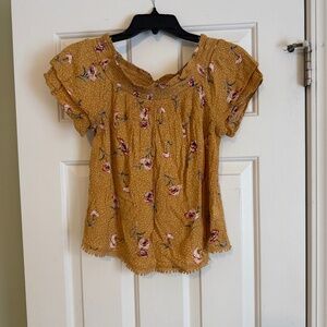 Light, flowy, floral off the shoulder or short sleeve blouse